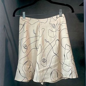 Nude Pink Abstract Face Mini Skirt